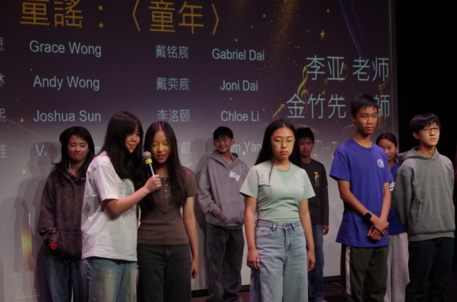 中學一班和學生志工表演童謠-童年