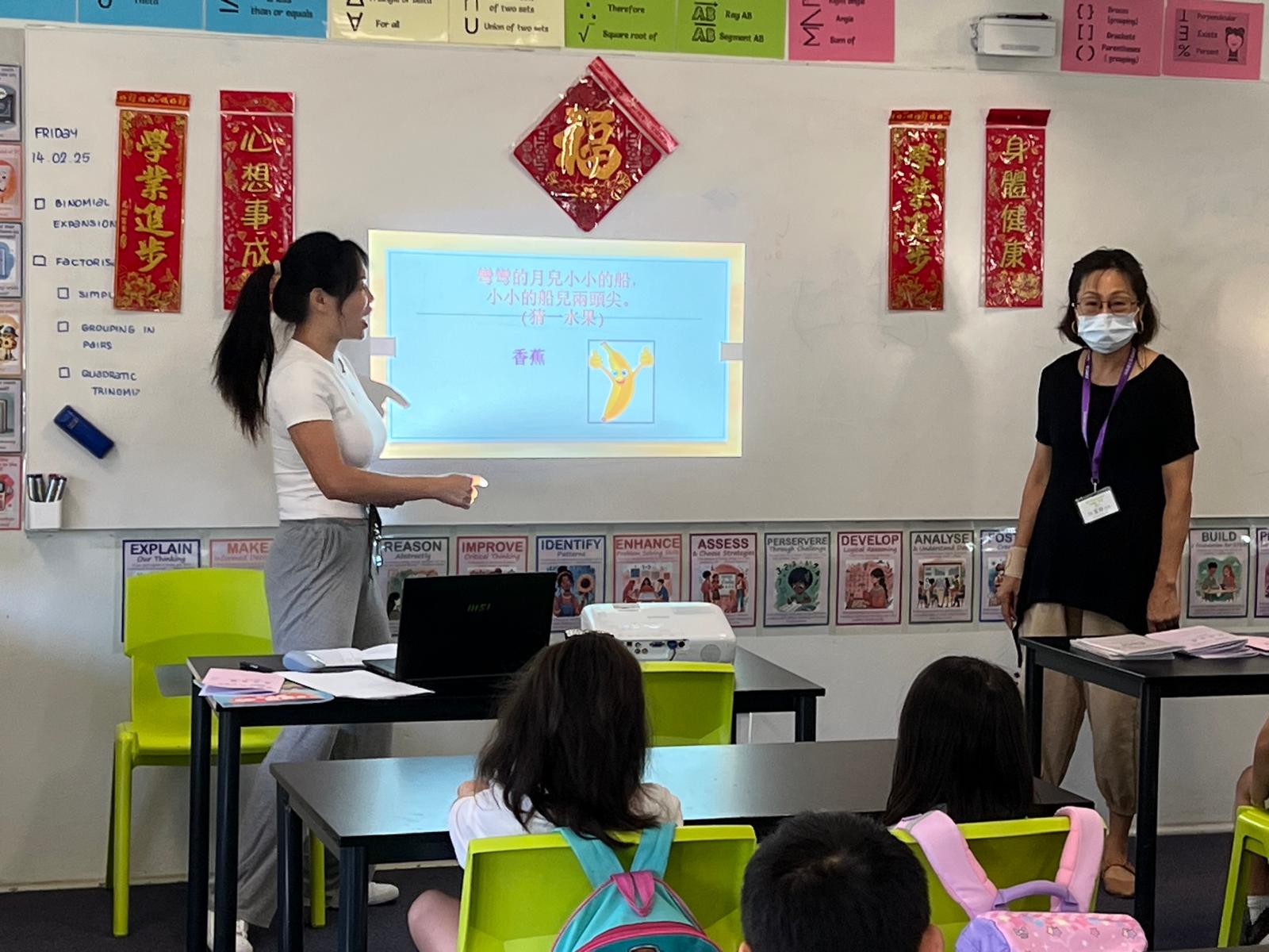 老師教學生猜燈謎