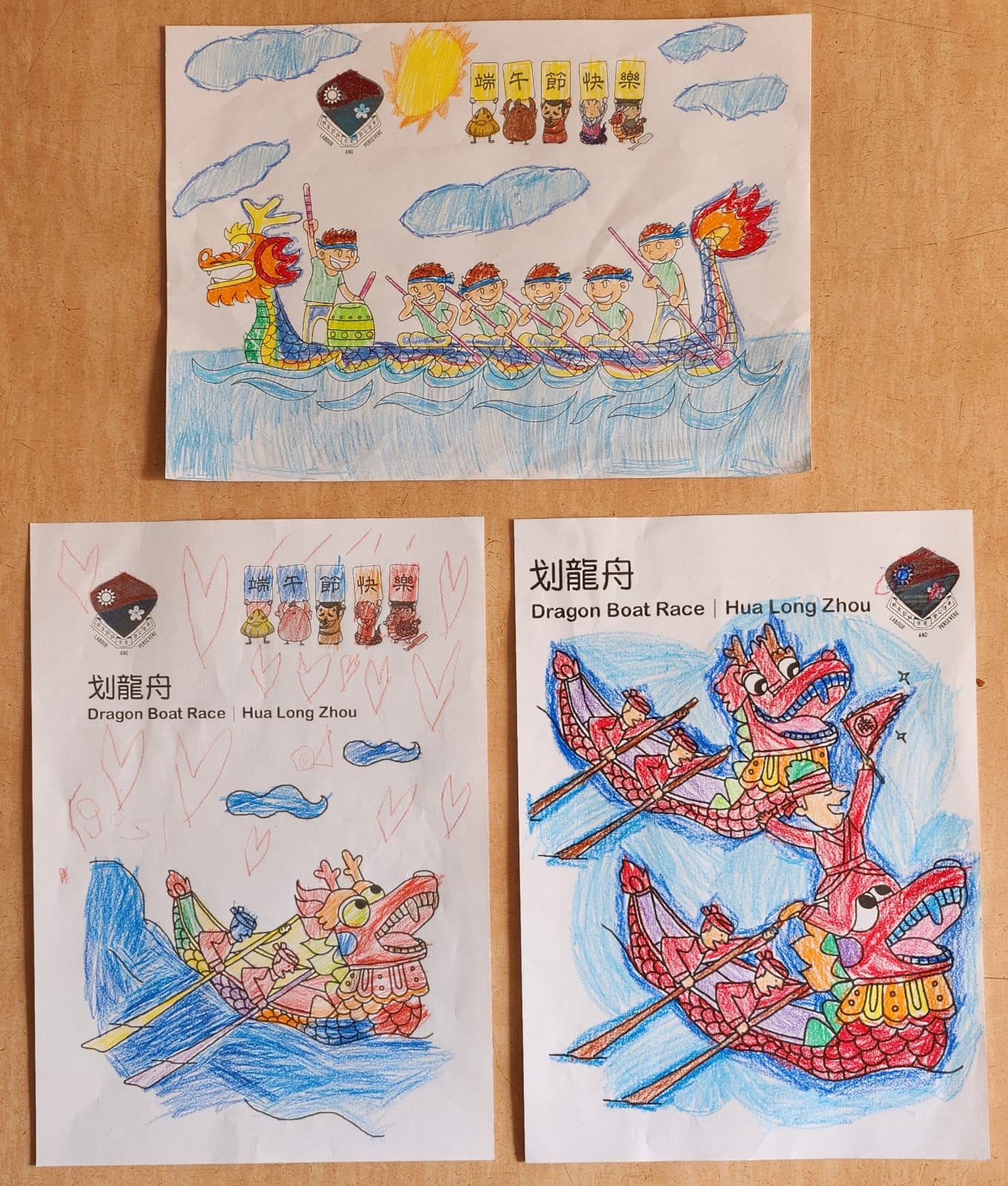 低年級學生參加端午節著色活動，划龍舟的熱鬧氣氛躍然紙上！